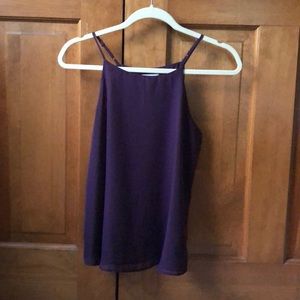 Halter blouse with adjustable straps.